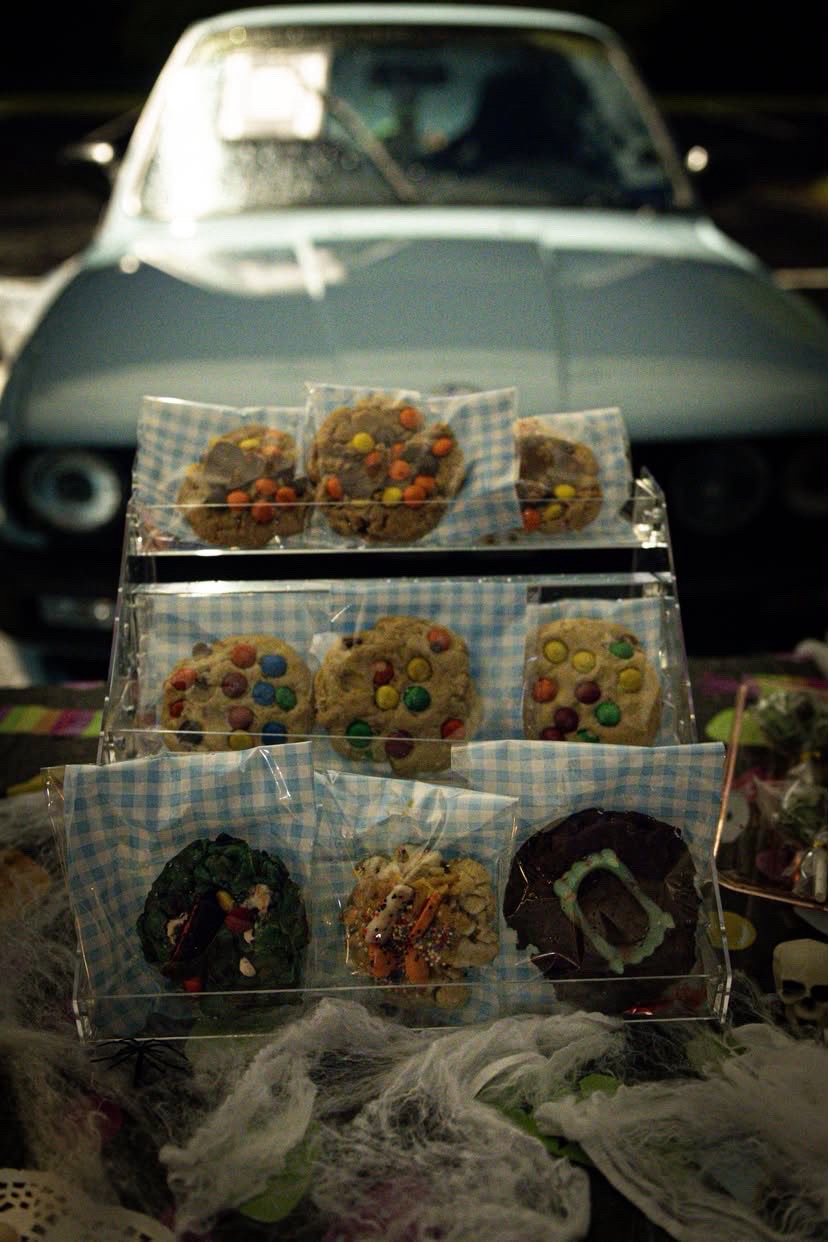Fresh cookies in gingham bags on display at the Friday night booth
